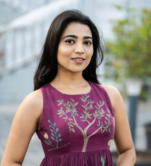 Bloom – Sleeveless Maroon Flared Dress with Nature-Inspired Embroidery