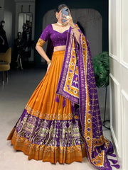 Orange Patola Tussar Silk Lehenga – Purple Blouse & Dupatta