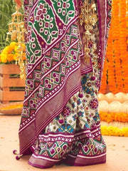 Beautiful Off-White & Purple Patola Printed Silk Events Wear Saree