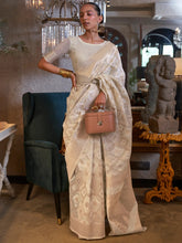 Charming Off-White Zari Weaving Linen Traditional Saree With Blouse