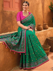 Enticing Green Mirror Work Banarasi Silk Saree With Blouse