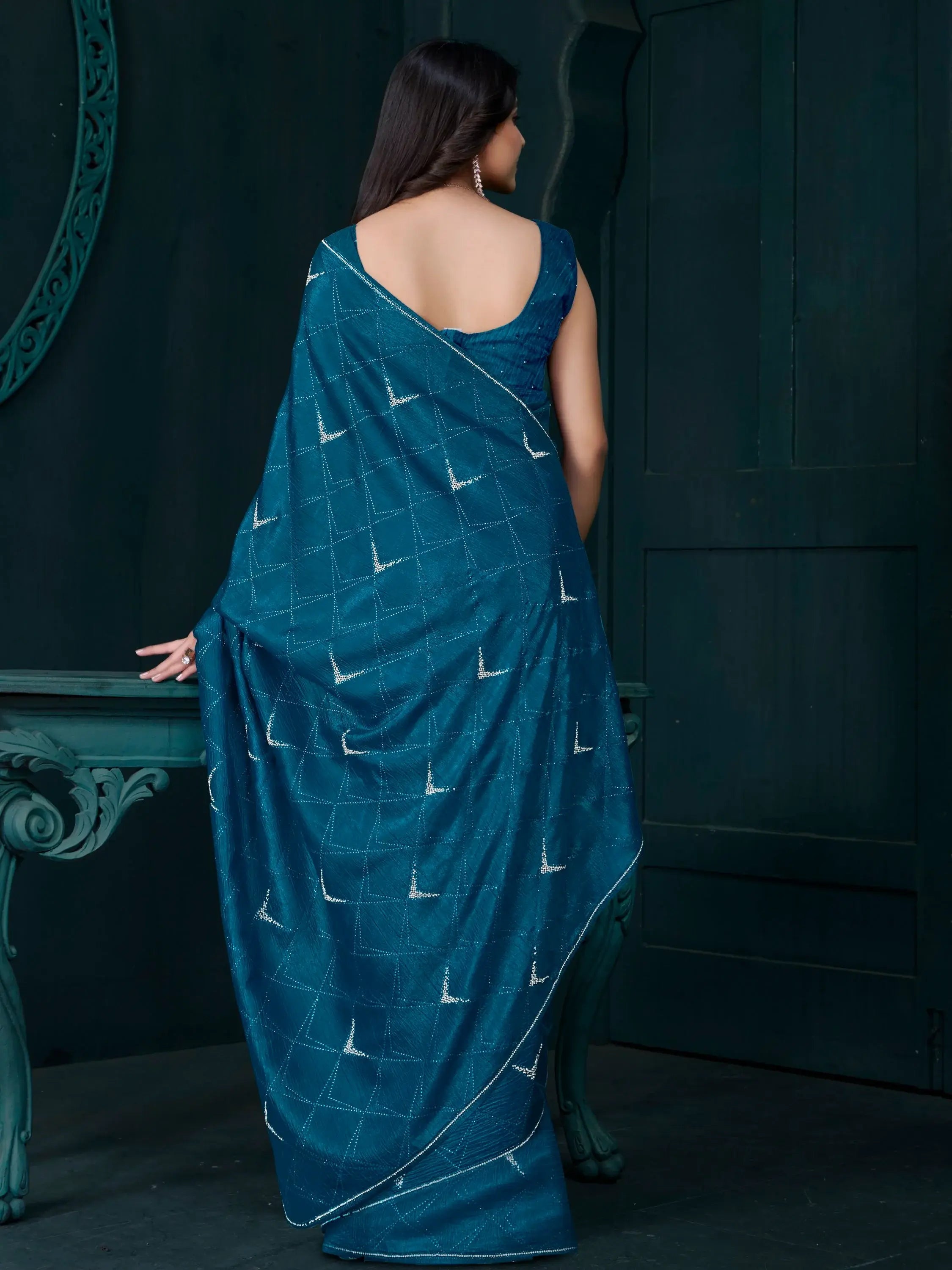 Fascinating Teal Blue Crepe Silk Party Wear Saree With Blouse